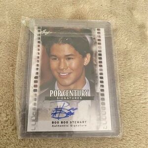 Pop Century Signatures card featuring a blue autograph. Boo Boo Stewart.